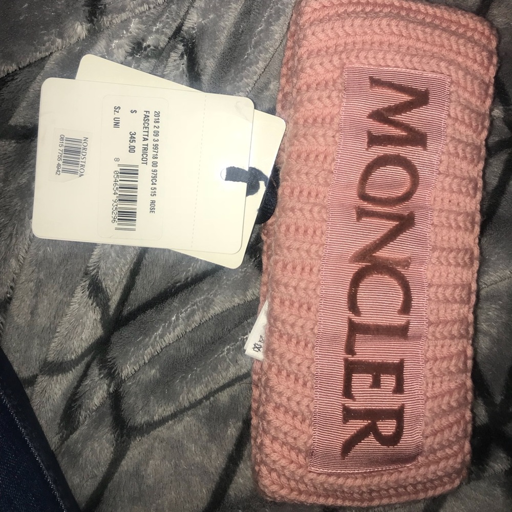 Moncler pink winter headwear.